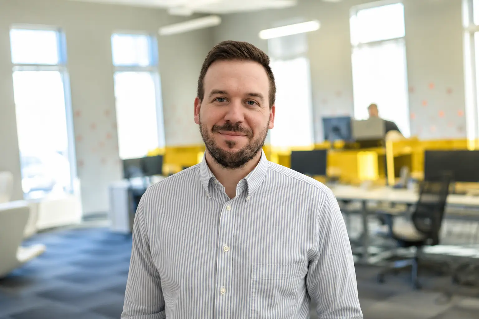 Portrait de John-Francis Lyons-McAlpin, gestionnaire de projets agiles chez Segic